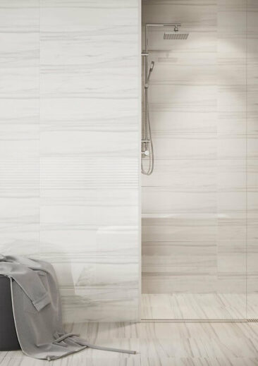 Artistic way - bathroom with grey-white stone tiles