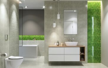 Grey concrete tiles and green glass tiles for bathroom